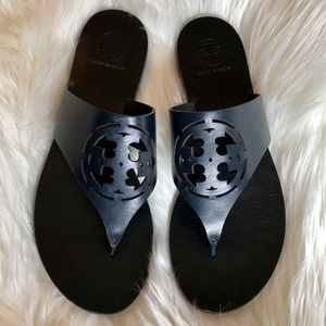Tory Burch deep navy thong sandals.